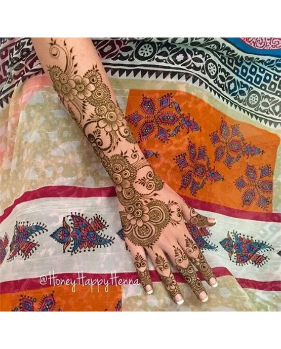 Creative Blend And Butterfly Featuring Back Hand Mehndi Design